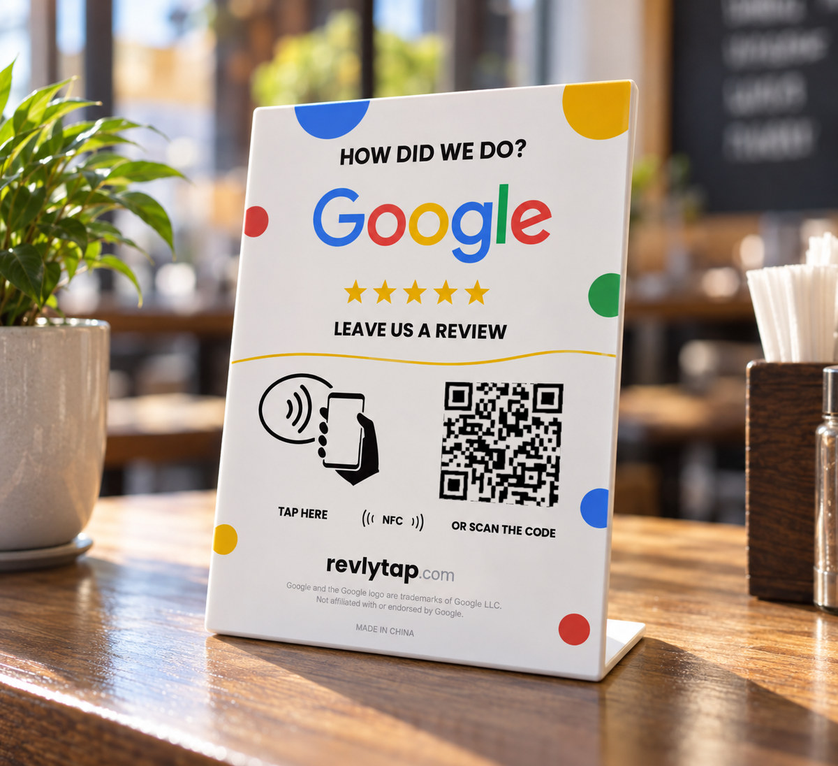 Revlytap tap-to-review stand on a restaurant counter